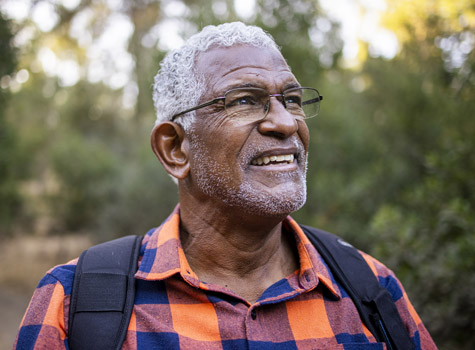 A senior man out jogging