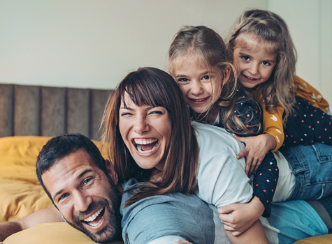 happy family at home relaxing, playing together