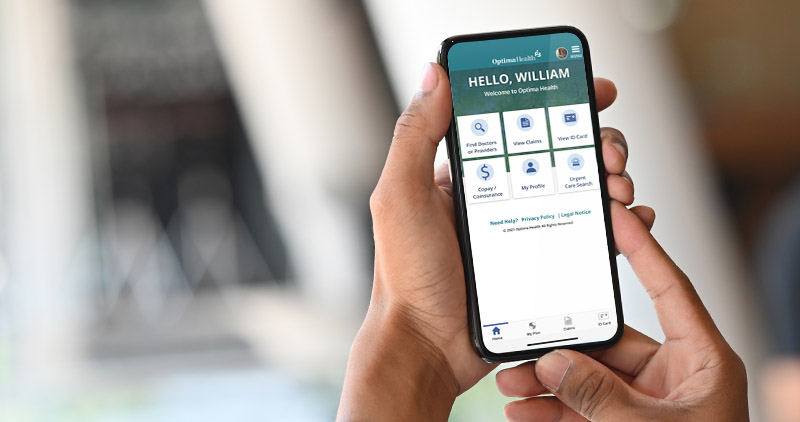 Close-up view of the Optima Health mobile app on a smartphone.