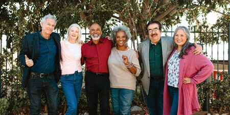 Elderly group of people smiling standing together