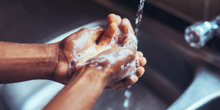 Person washing their hands