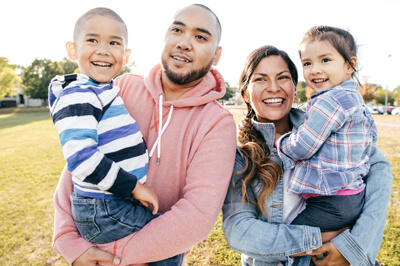 family with young children enjoying the outdoors