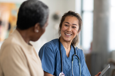 A physician counseling a patient