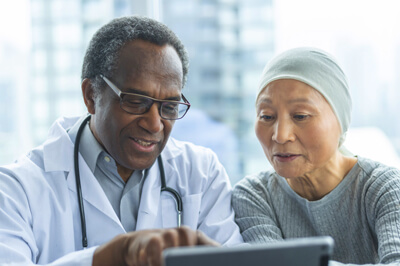 Doctor and patient reviewing results together