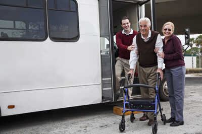 Healthcare transportation shuttle dropping off patient