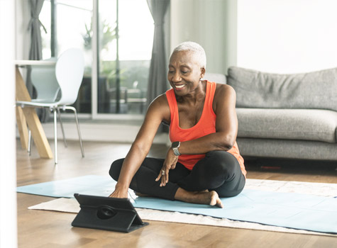 Senior woman using WebMD to motivate her to new levels of fitness.