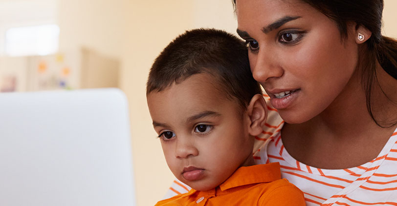 Mother and child using a laptop